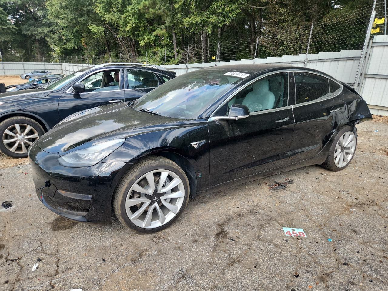 2018 Tesla Model 3 Long Range Battery, VIN 5YJ3E1EA7JF177783 — Rear end