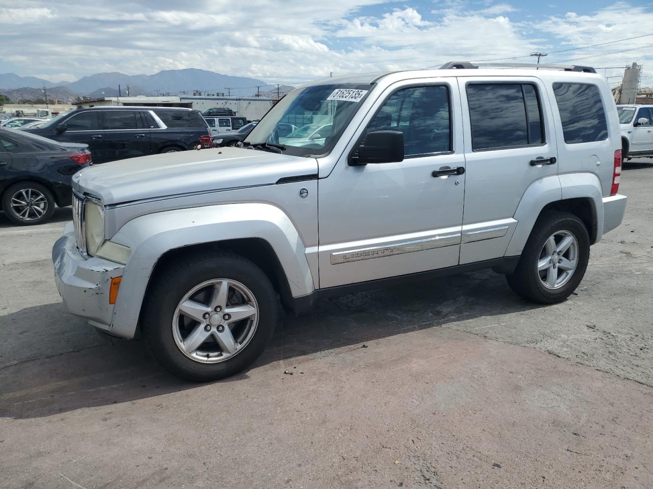 2012 Jeep Liberty Limited, VIN 1C4PJMCK7CW143478 — Бок