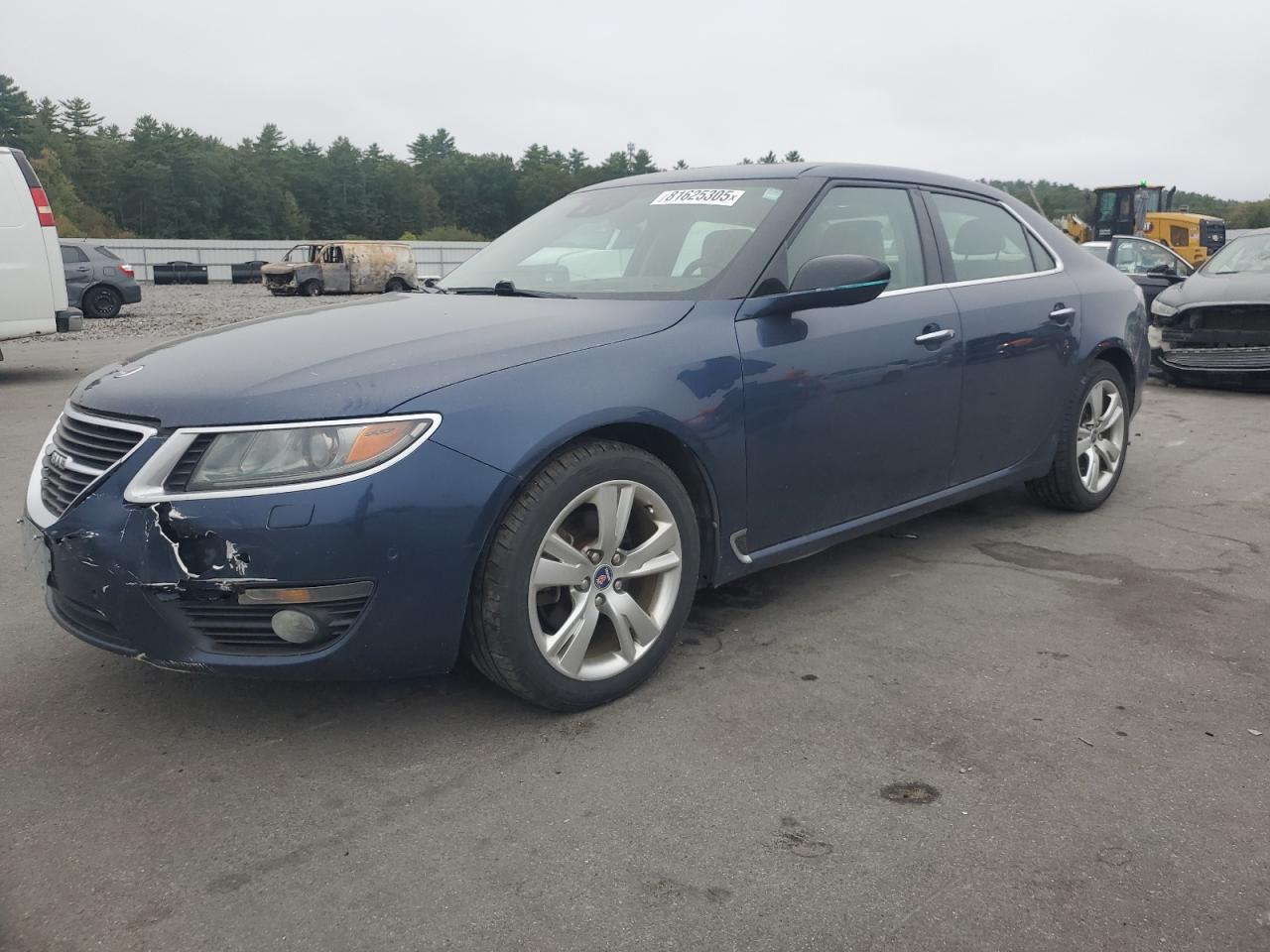 2011 Saab 9-5 Turbo4, VIN YS3GN4AR4B4007705 — Side