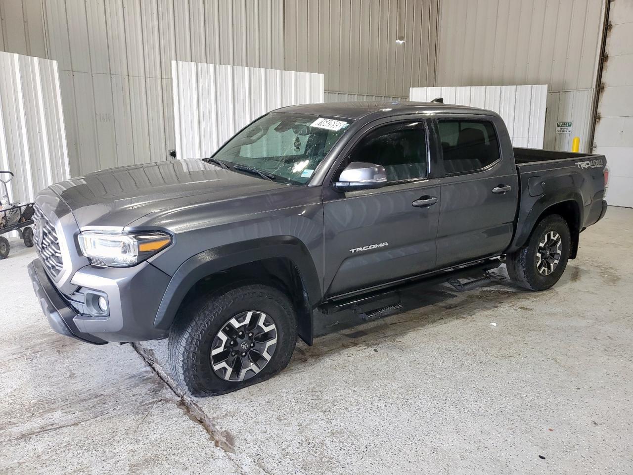 2023 Toyota Tacoma TRD Off Road, VIN 3TMCZ5ANXPM556723 — Side