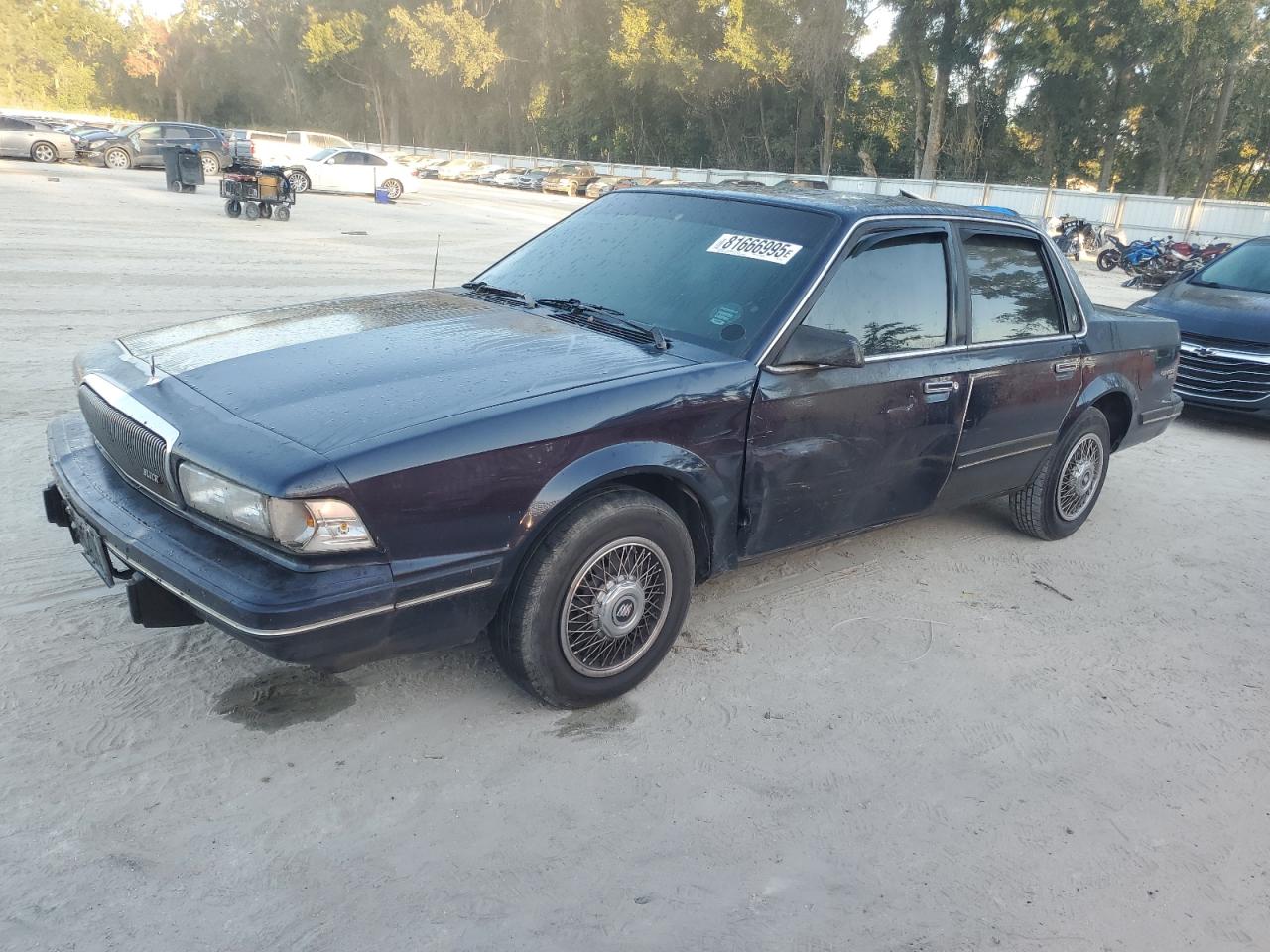 1995 Buick Century Limited SL, VIN 1G4AG55M3S6446051 — Side