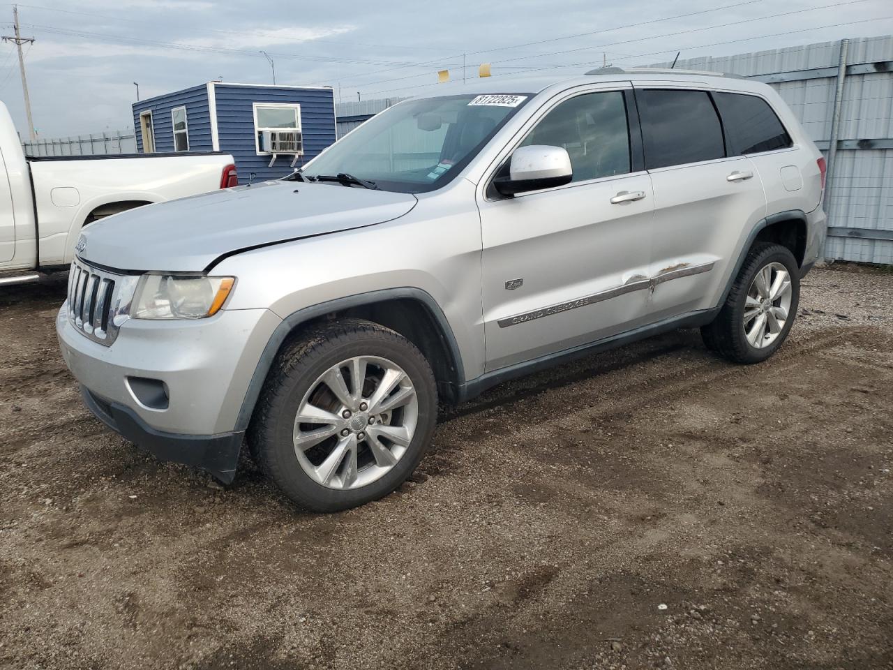2011 Jeep Grand Cherokee Laredo, VIN 1J4RR4GG5BC675667 — Side