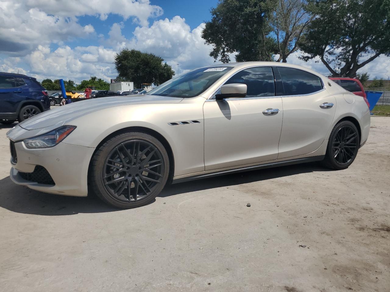 2014 Maserati Ghibli S Q4, VIN ZAM57RTA0E1103670 — Undercarriage