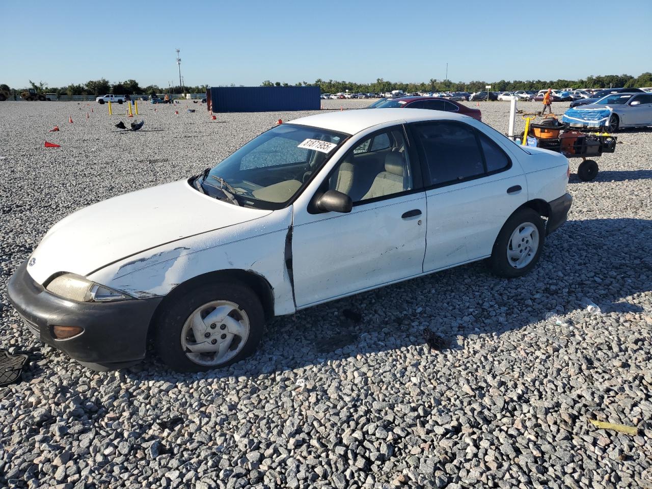1999 Chevrolet Cavalier, VIN 1G1JC5243X7292004 — Side