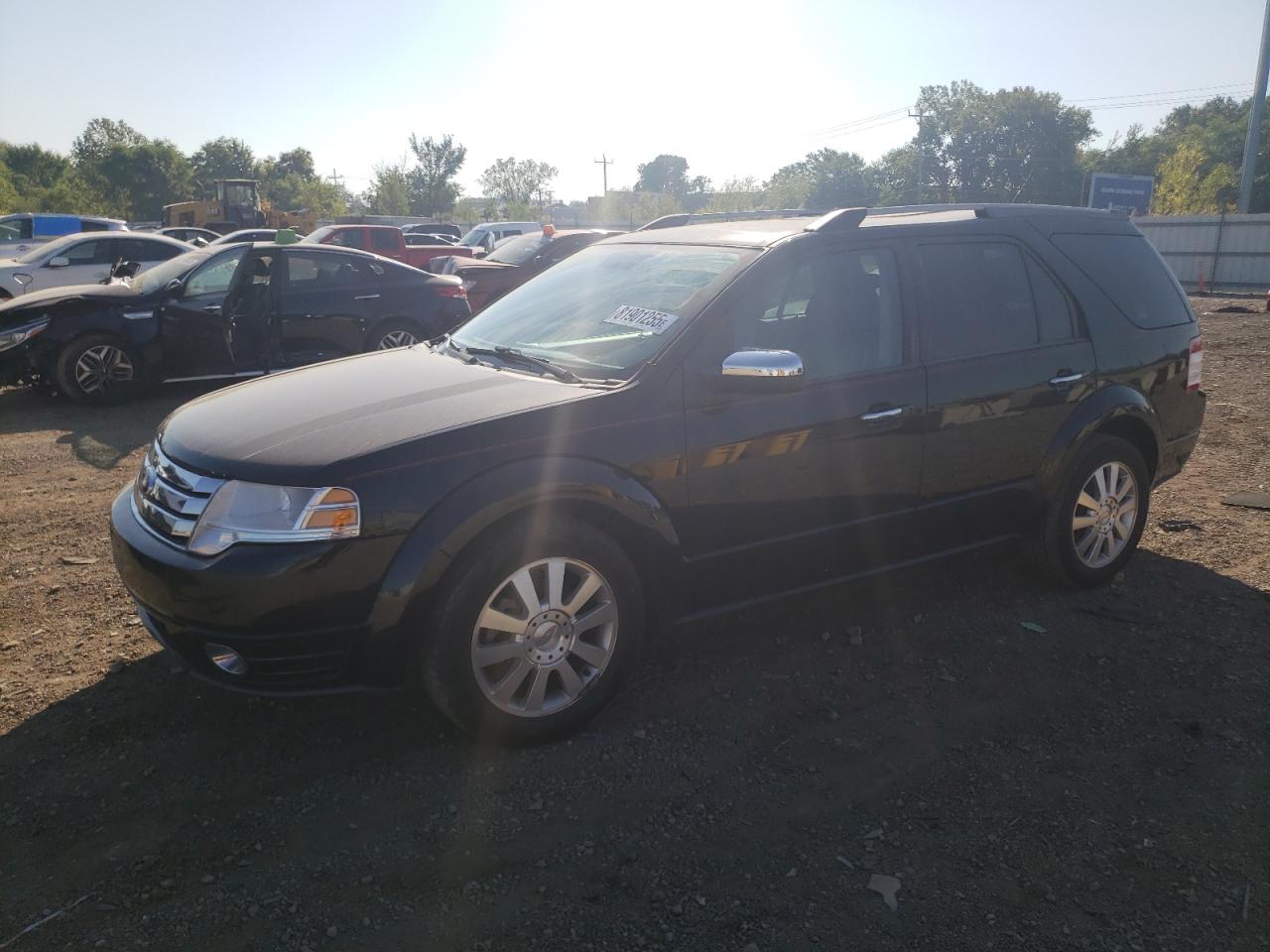 2008 Ford Taurus X Limited, VIN 1FMDK03WX8GA07600 — Side
