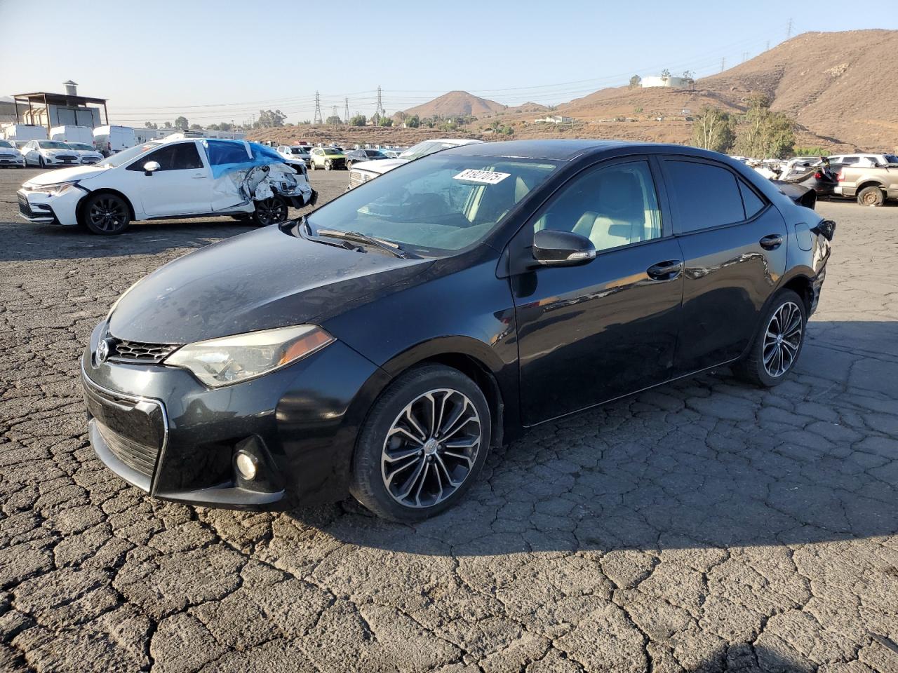2015 Toyota Corolla S Plus, VIN 5YFBURHEXFP234873 — Rear end