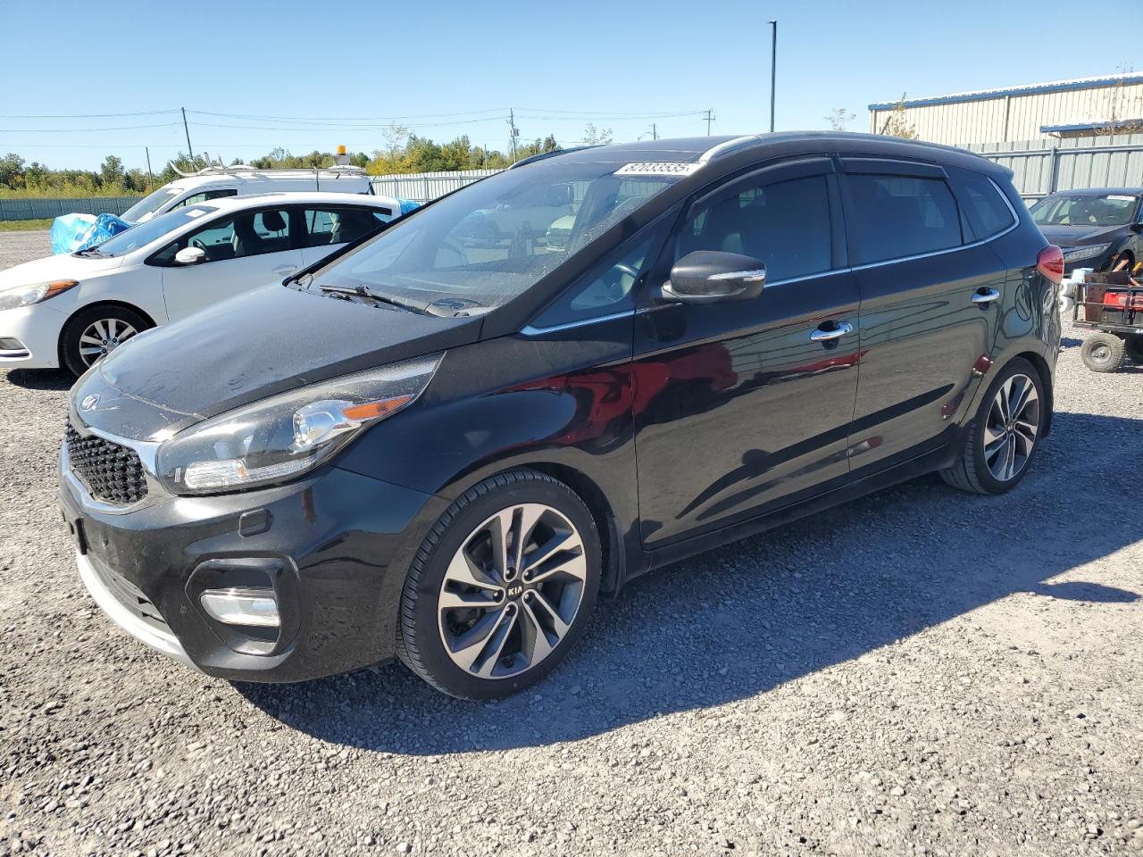 2017 Kia Rondo EX, VIN KNAHU8A37H7174436 — Rear end