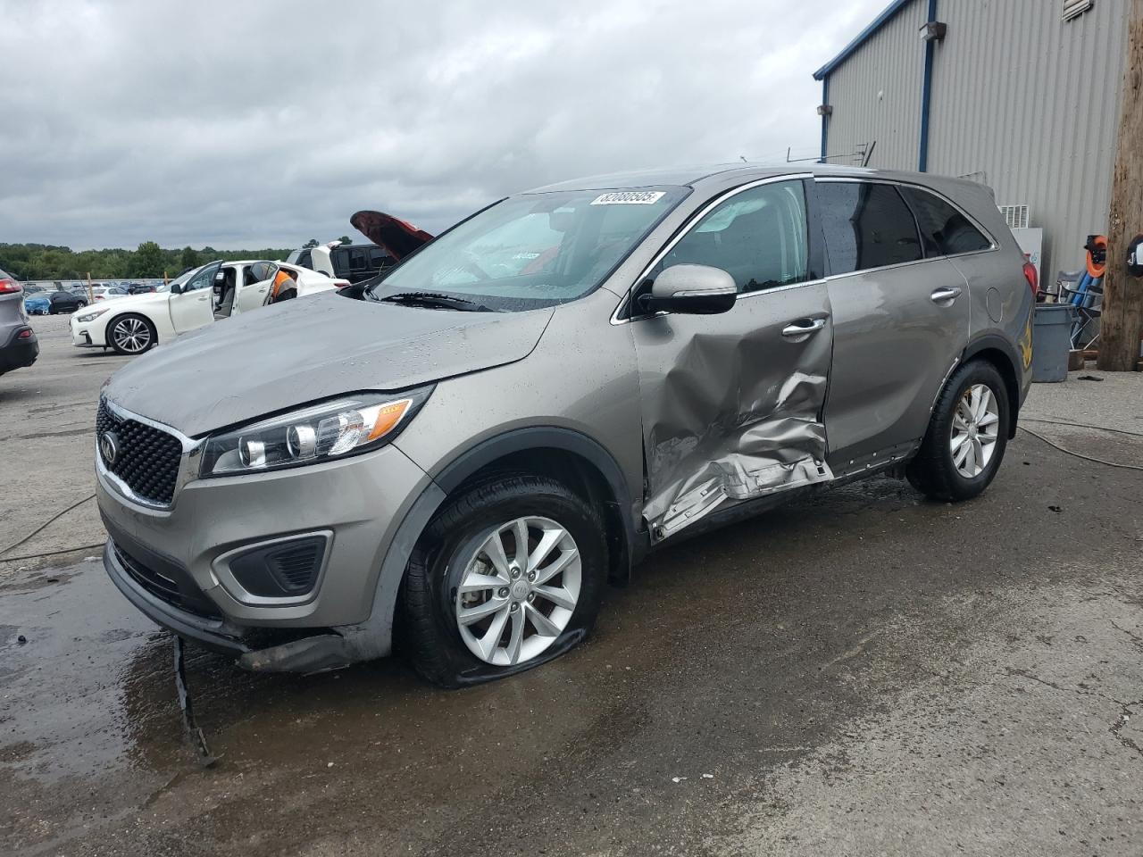 2017 Kia Sorento LX, VIN 5XYPG4A35HG193603 — Side
