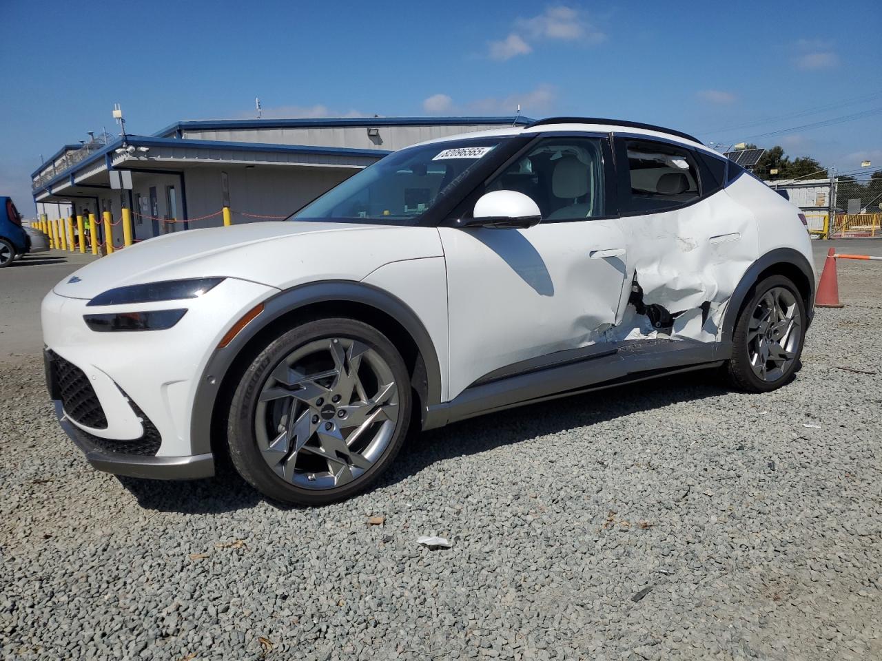 2023 Genesis GV60 Performance, VIN KMUKEDTB9PU006555 — Side