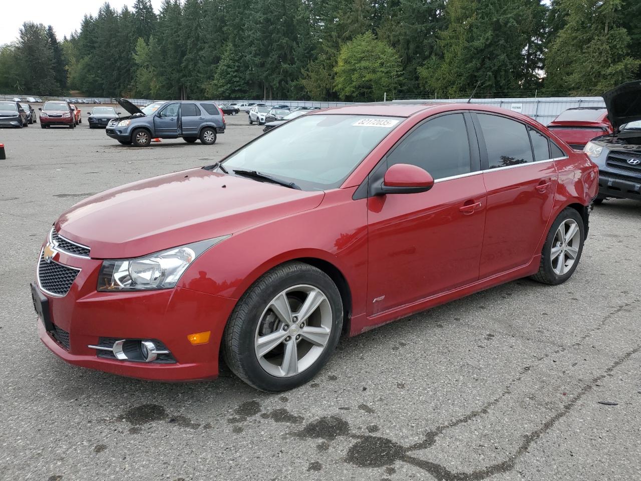 2014 Chevrolet Cruze 2LT, VIN 1G1PE5SB3E7358843 — Side