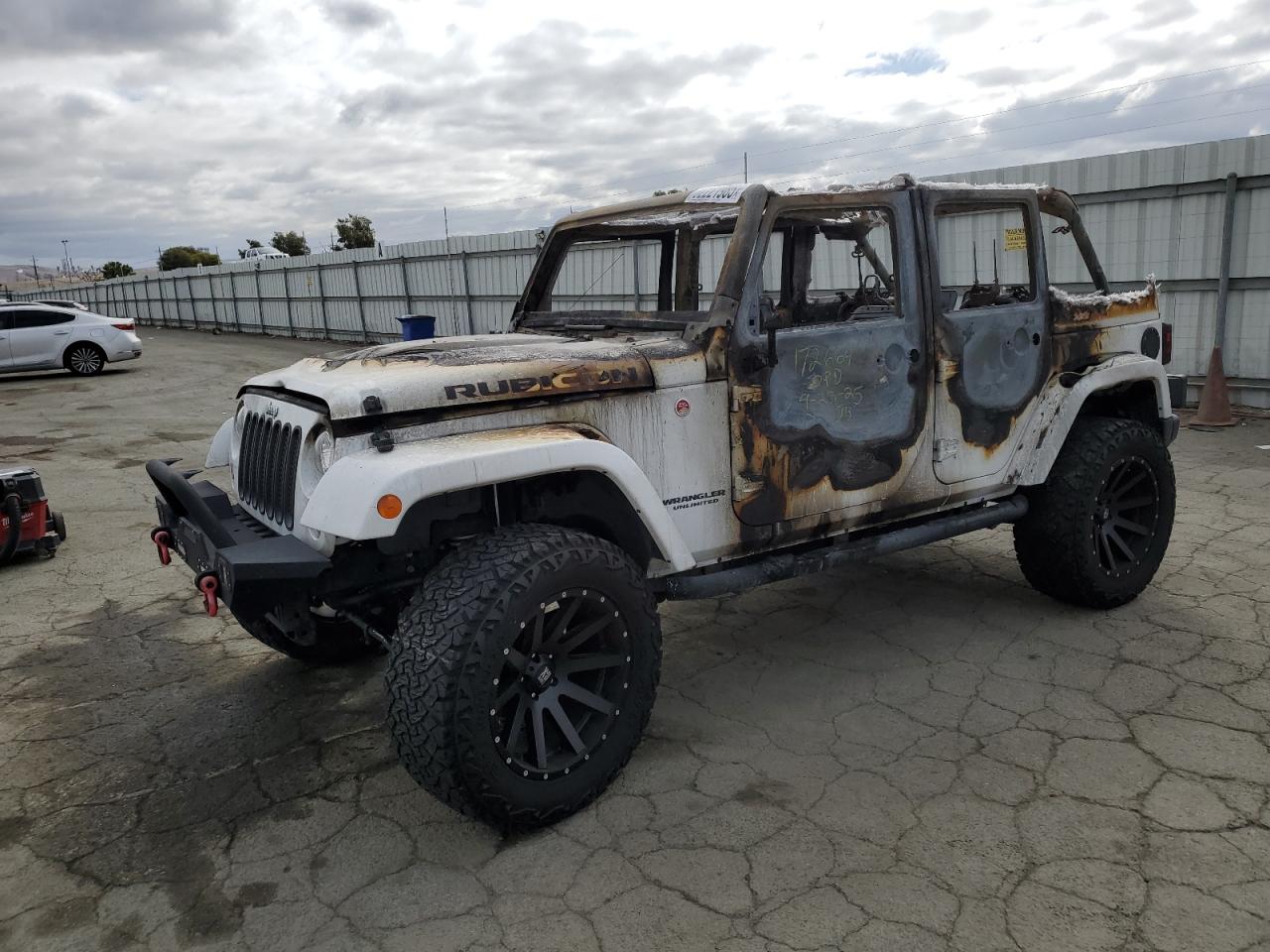 2017 Jeep Wrangler Unlimited Rubicon Hard Rock, VIN 1C4BJWFG0HL543260 — Burn