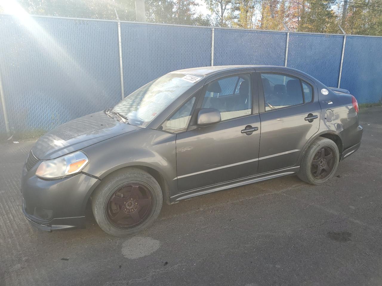 2011 Suzuki SX4 Sport, VIN JS2YC5A8XB6300212 — Minor dents and scratches