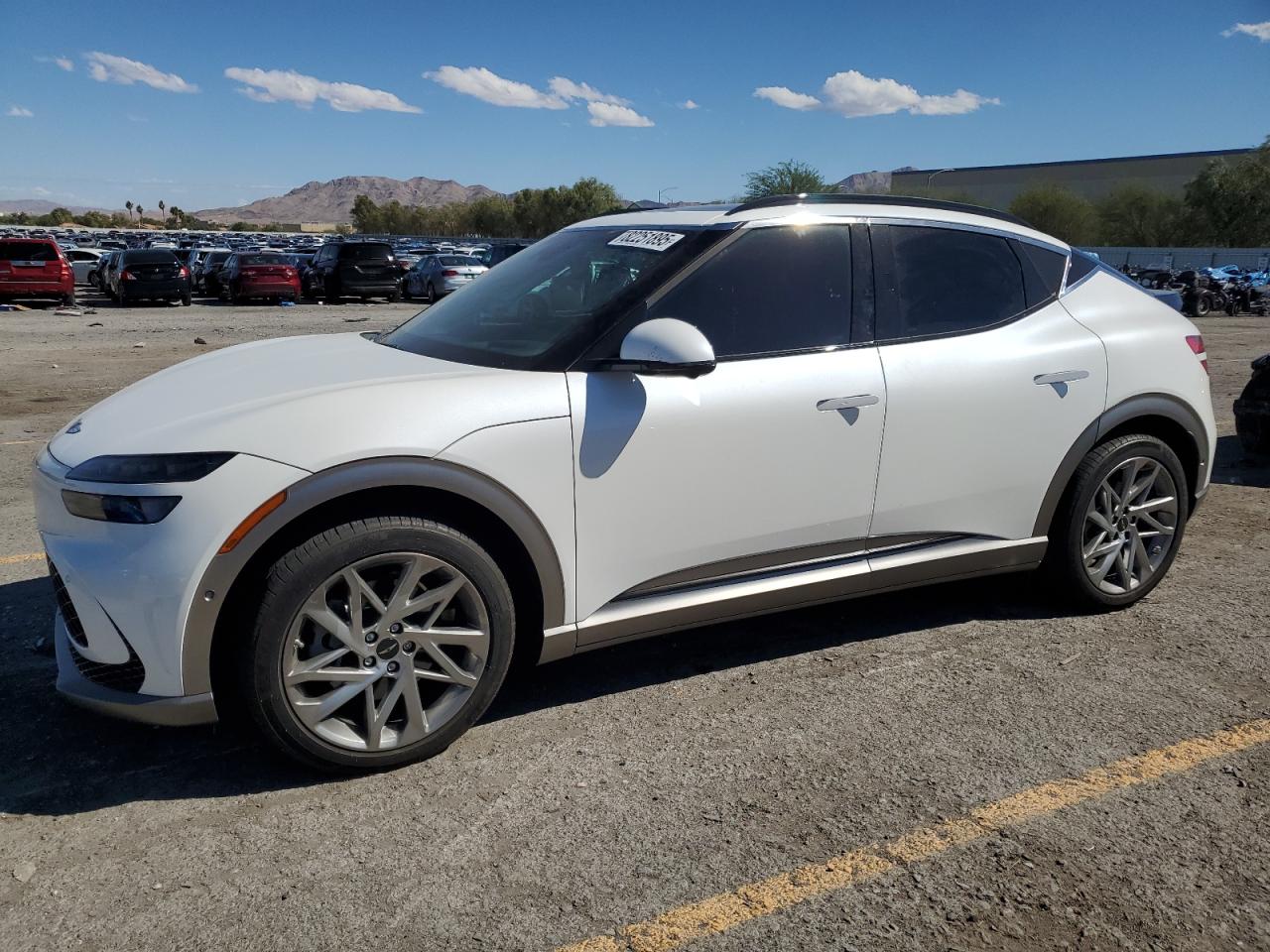 2023 Genesis GV60 Advanced, VIN KMUKCDTC9PU014055 — Side