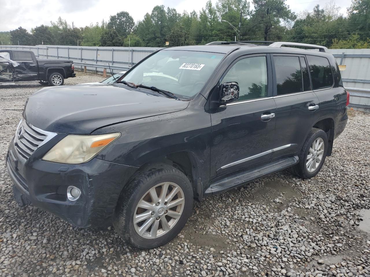 2009 Lexus LX 570, VIN JTJHY00W694025942 — Перед