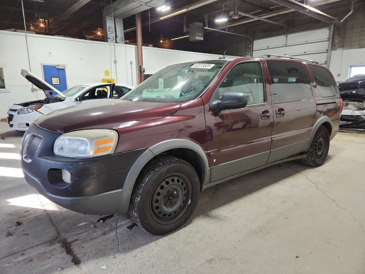2008 Pontiac Montana, VIN 1GMDV23W28D187868 — Side
