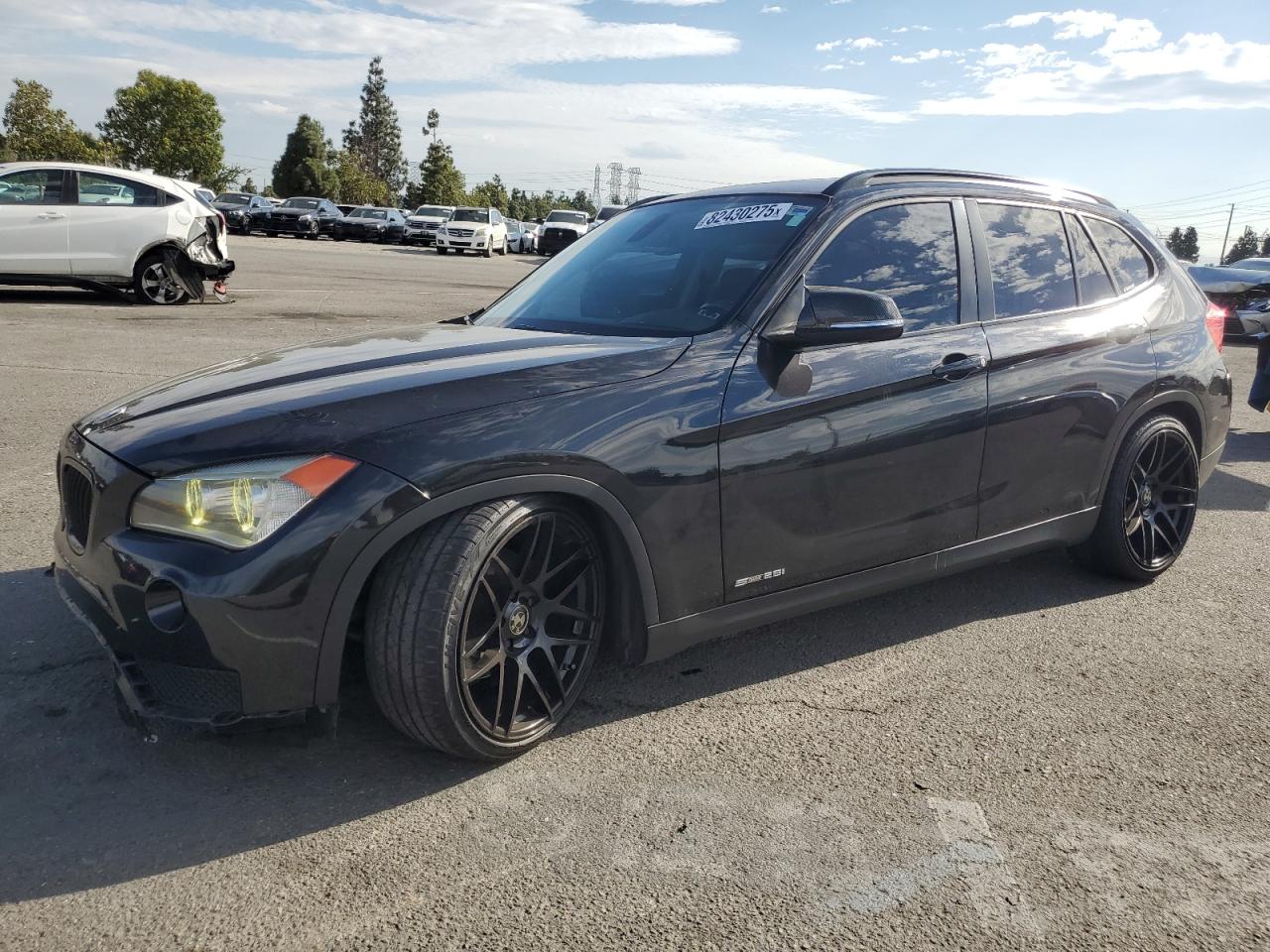 2015 BMW X1 sDrive28i, VIN WBAVM1C57FV318312 — Undercarriage