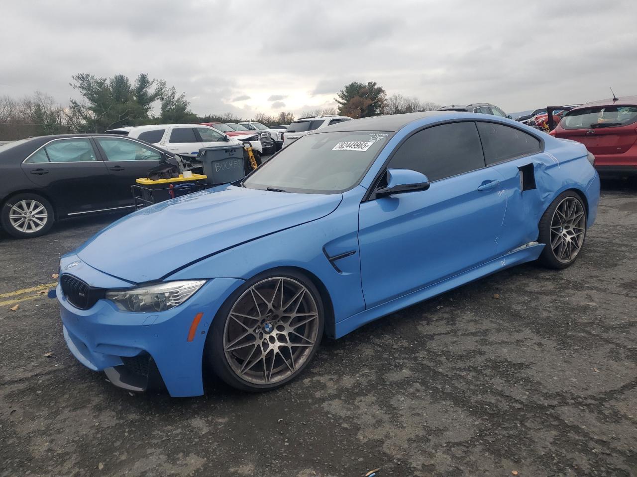 2017 BMW M4, VIN WBS3R9C53HK709240 — Side