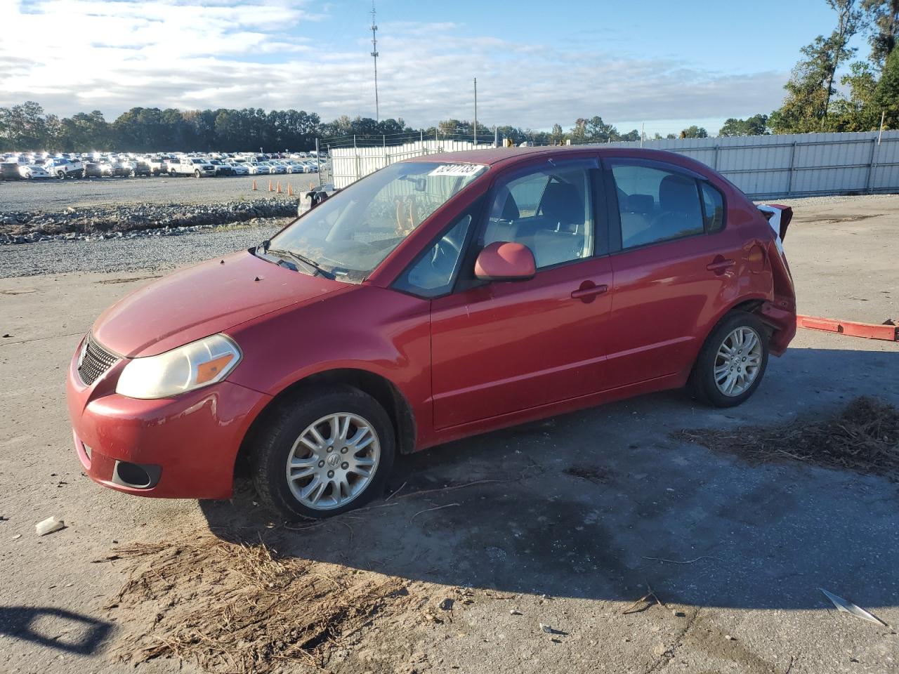 2012 Suzuki SX4 LE, VIN JS2YC5A36C6304196 — Rear end
