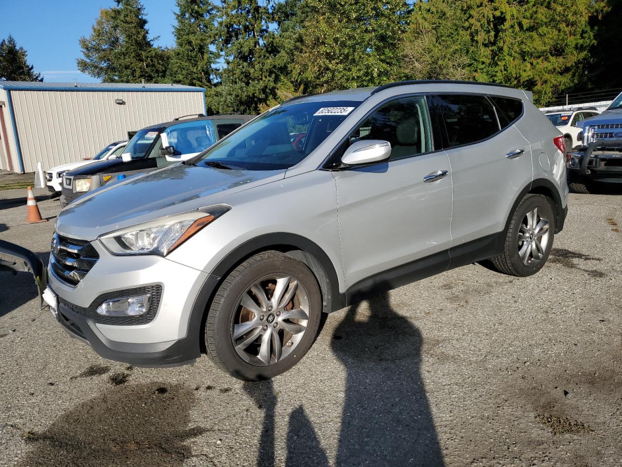 2013 Hyundai Santa Fe Sport, VIN 5XYZUDLA3DG042752 — Minor dents and scratches