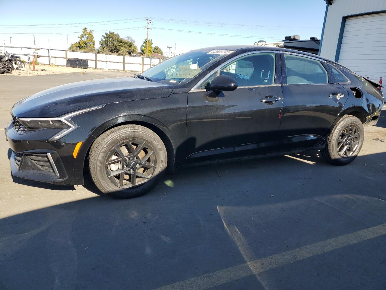 2025 Kia K5 LXS, VIN KNAG24J74S5301904 — Rear end