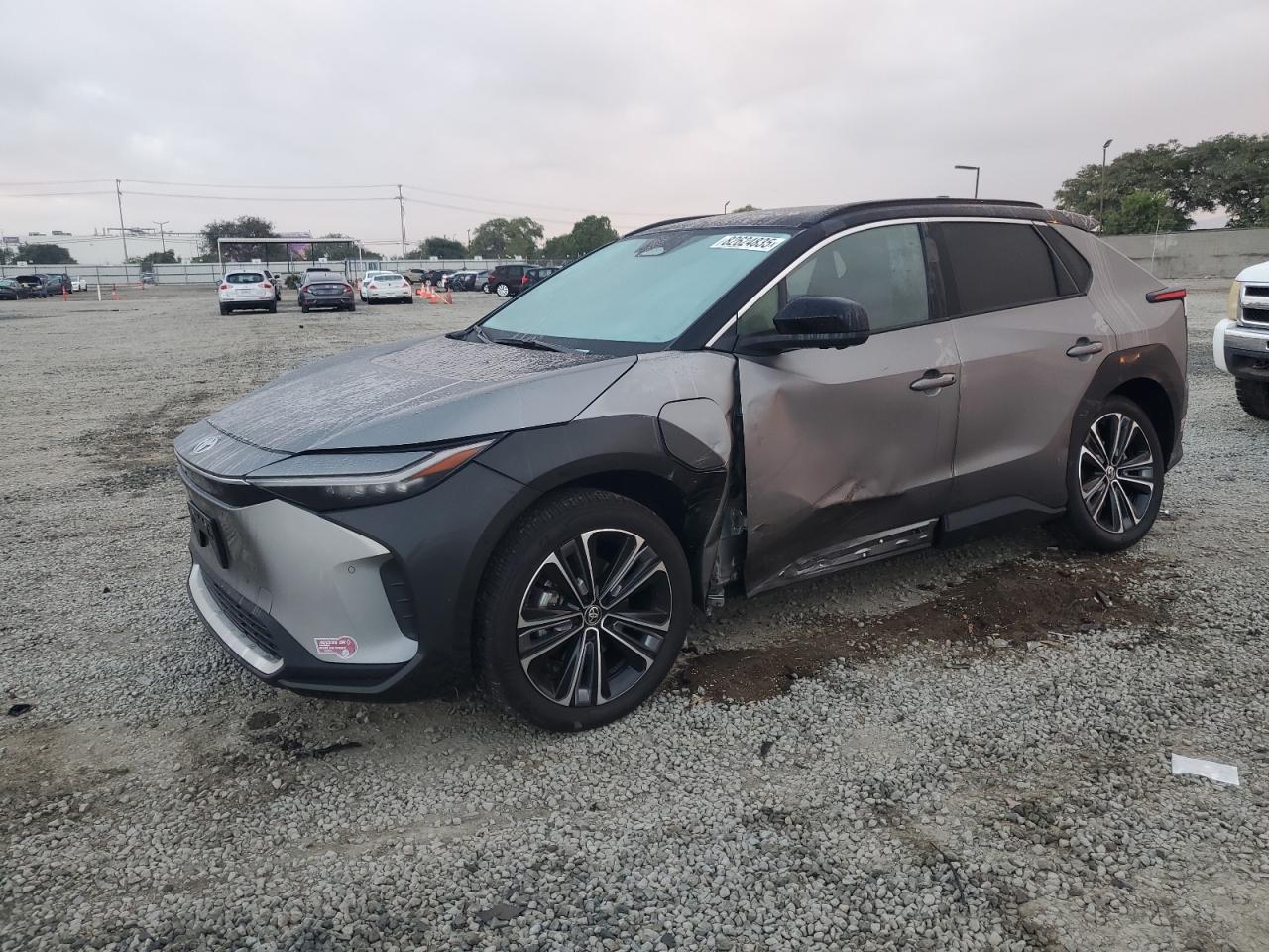 2024 Toyota bZ4X Limited, VIN JTMAAAAA3RA032575 — Side