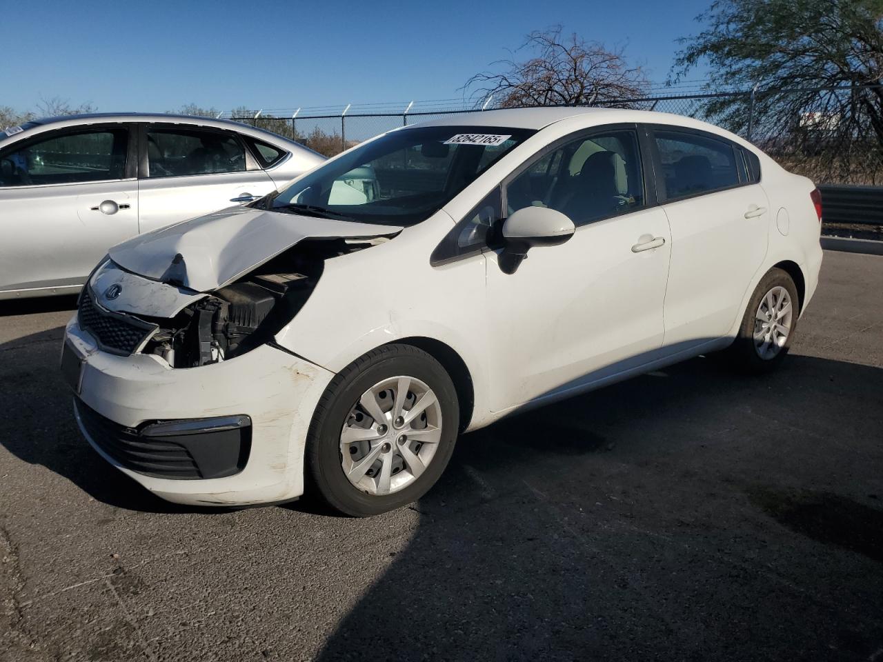 2016 Kia Rio LX, VIN KNADM4A34G6576538 — Auction photo 1 of 12