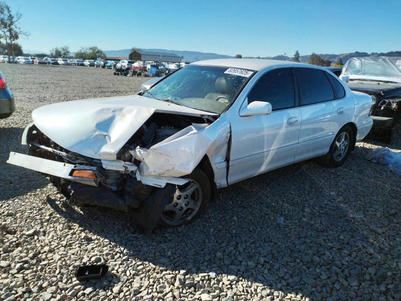 1997 Toyota Avalon XL, VIN 4T1BF12B9VU177105 — Front end