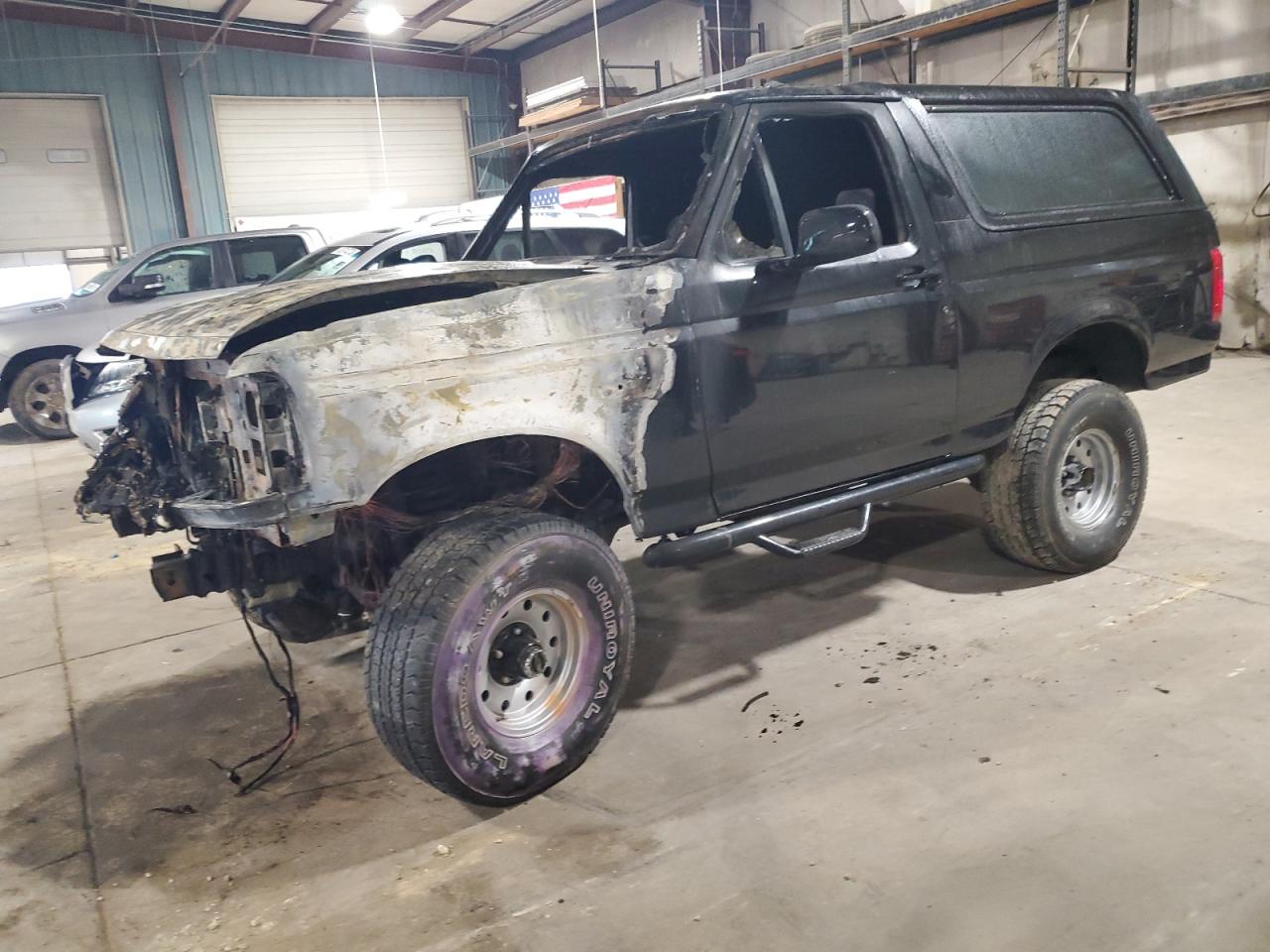 1993 Ford Bronco Custom, VIN 1FMEU15H6PLB07508 — Engine fire