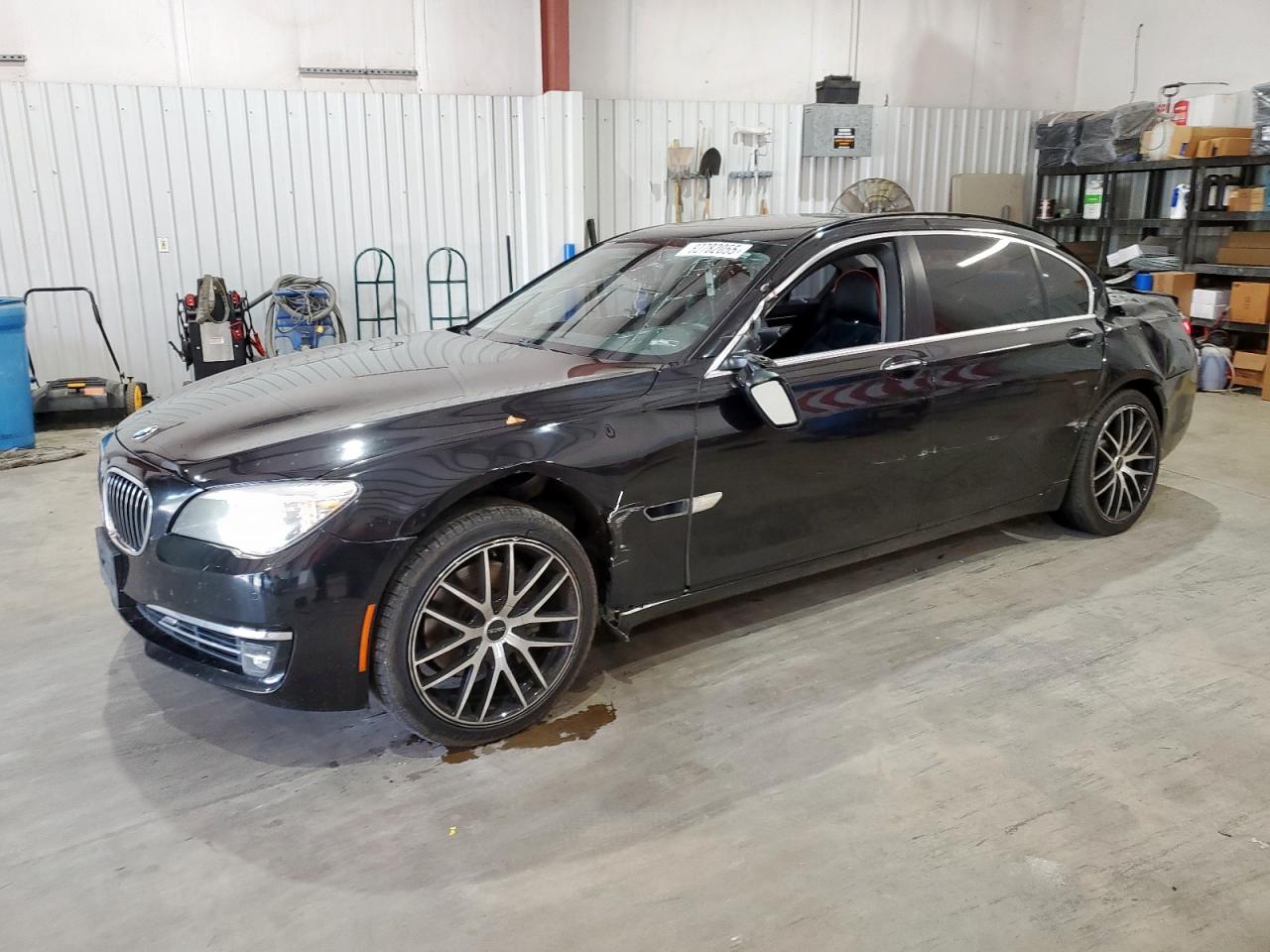 2013 BMW 7 Series 740Li, VIN WBAYE4C52DD136998 — Rear end
