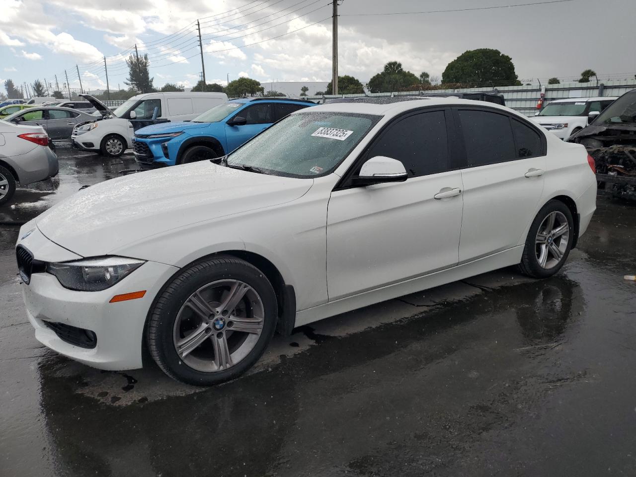 2015 BMW 3 Series 328i xDrive, VIN WBA3B3G5XFNR87595 — Side