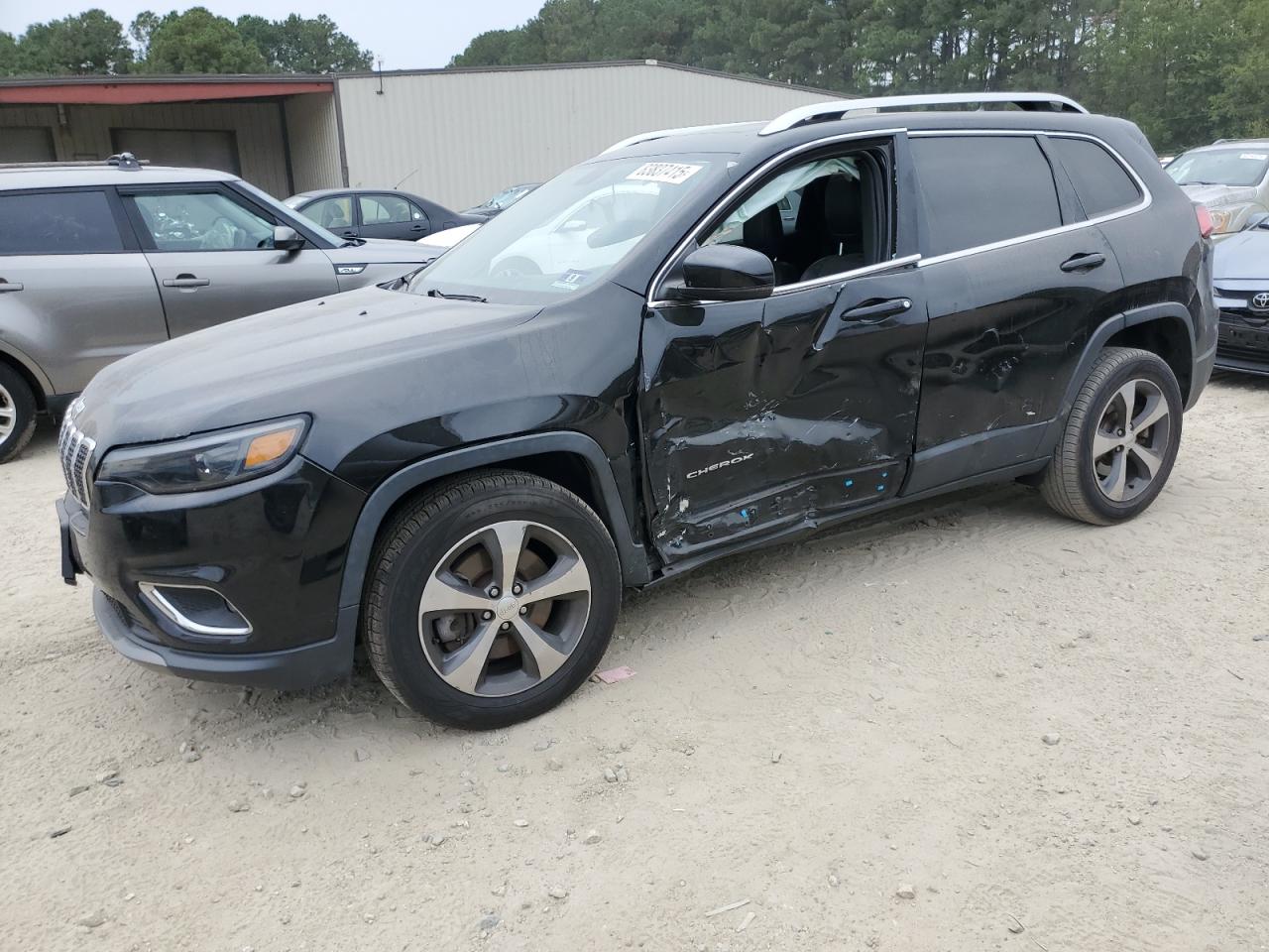 2019 Jeep Cherokee Limited, VIN 1C4PJMDXXKD126260 — Side