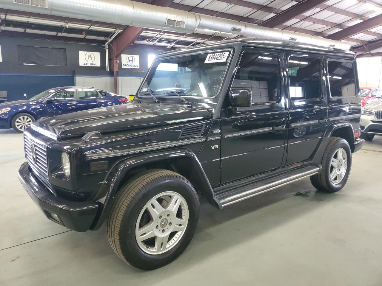2002 Mercedes-Benz G 500, VIN WDCYR49E72X133924 — Minor dents and scratches