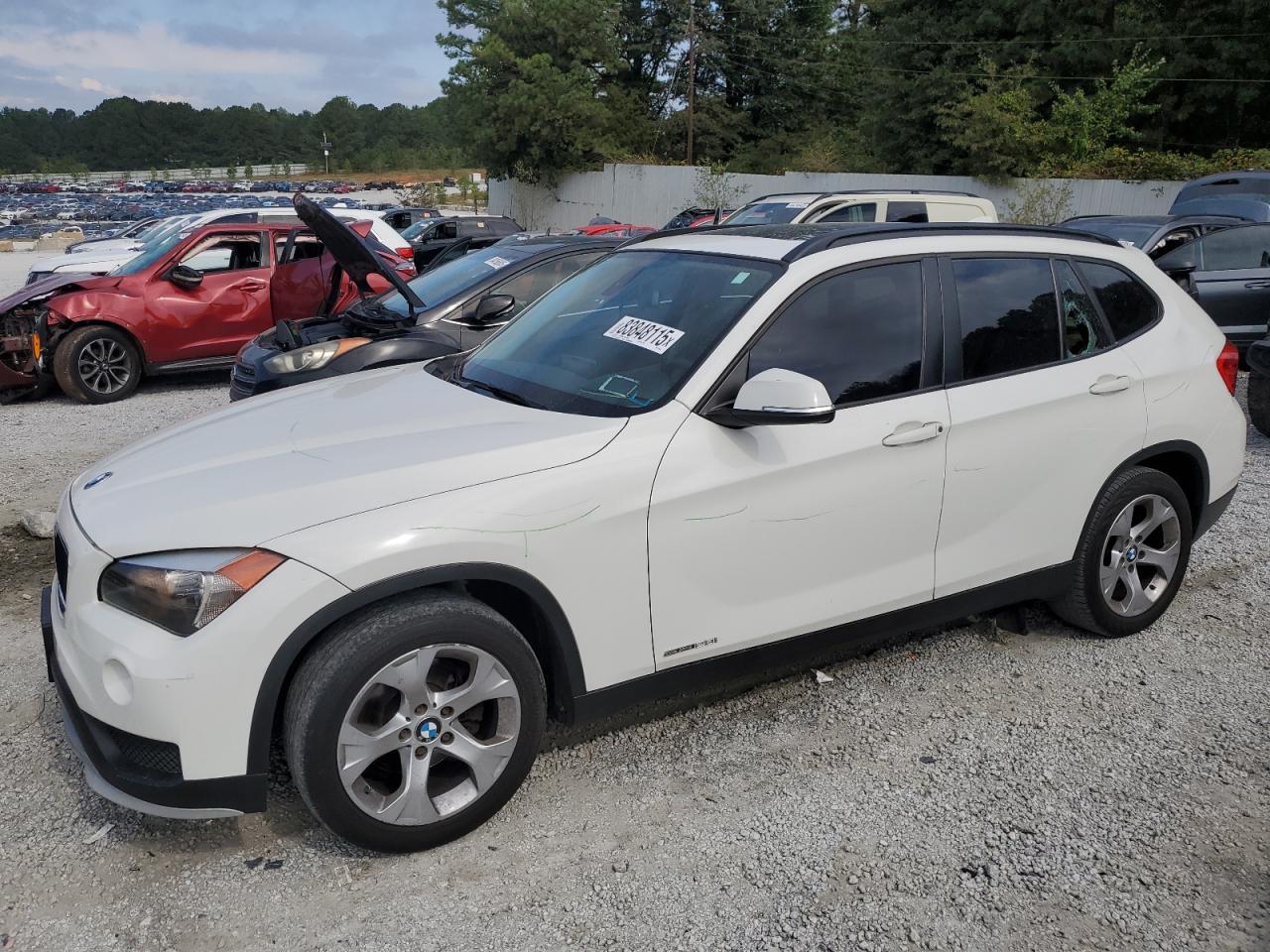 2015 BMW X1 sDrive28i, VIN WBAVM1C59FV316593 — Vandalism