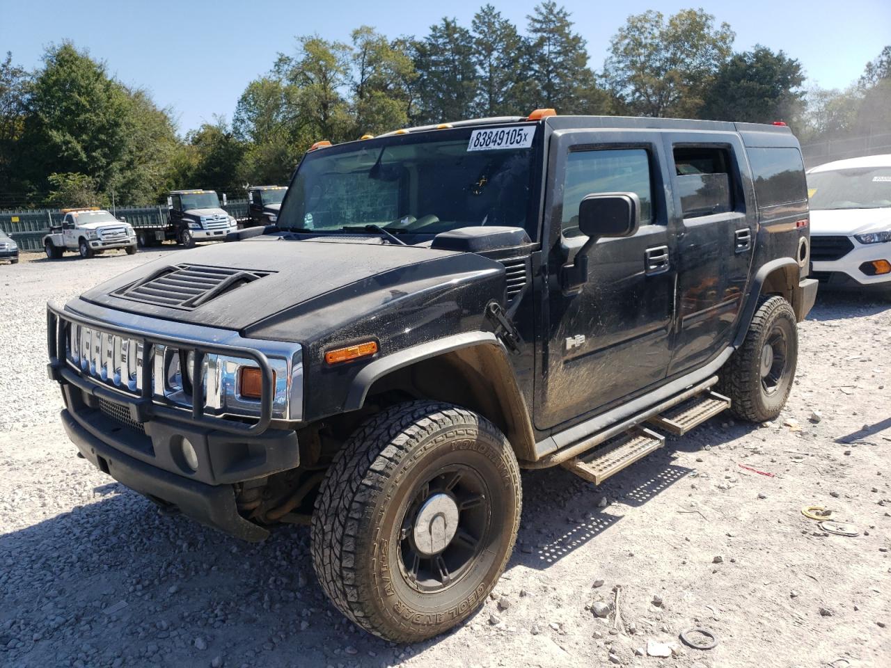 2003 Hummer H2, VIN 5GRGN23U33H120437 — Бок