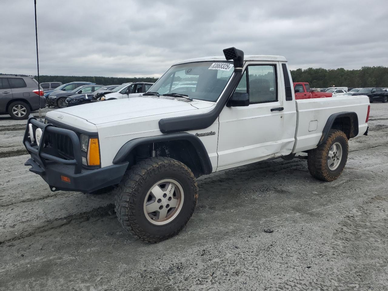 1991 Jeep Comanche, VIN 1J7FT26S9ML581330 — Side