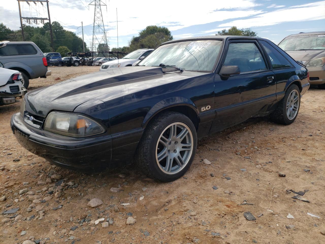 1992 Ford Mustang LX, VIN 1FACP41E1NF142121 — Prior damage history