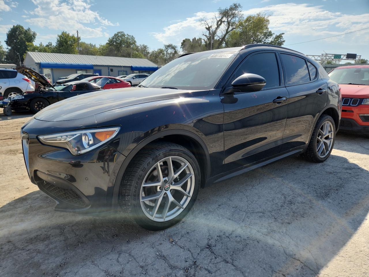 2018 Alfa Romeo Stelvio Ti Sport, VIN ZASFAKNN9J7B60983 — Hail