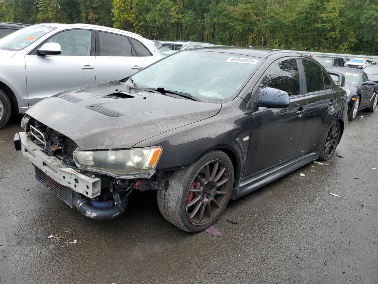 2014 Mitsubishi Lancer Evolution GSR, VIN JA32W8FV8EU014042 — Front end