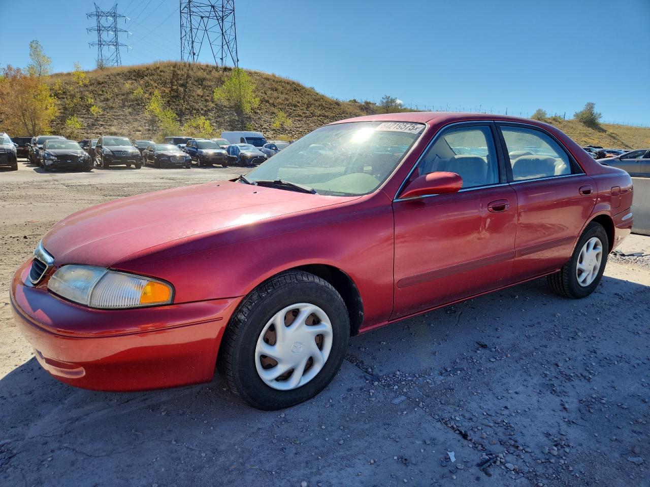 1999 Mazda 626 ES, VIN 1YVGF22C9X5825350 — Side