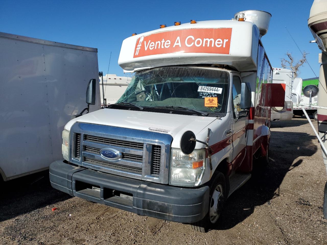 2010 Ford Econoline Commercial, VIN 1FDEE3FL2ADA52729 — Side