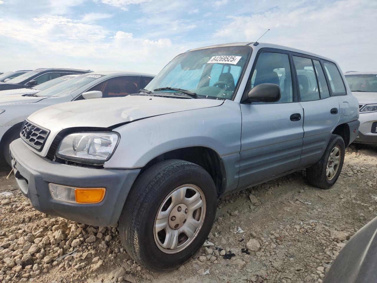 1998 Toyota RAV4, VIN JT3GP10V7W0031755 — Side