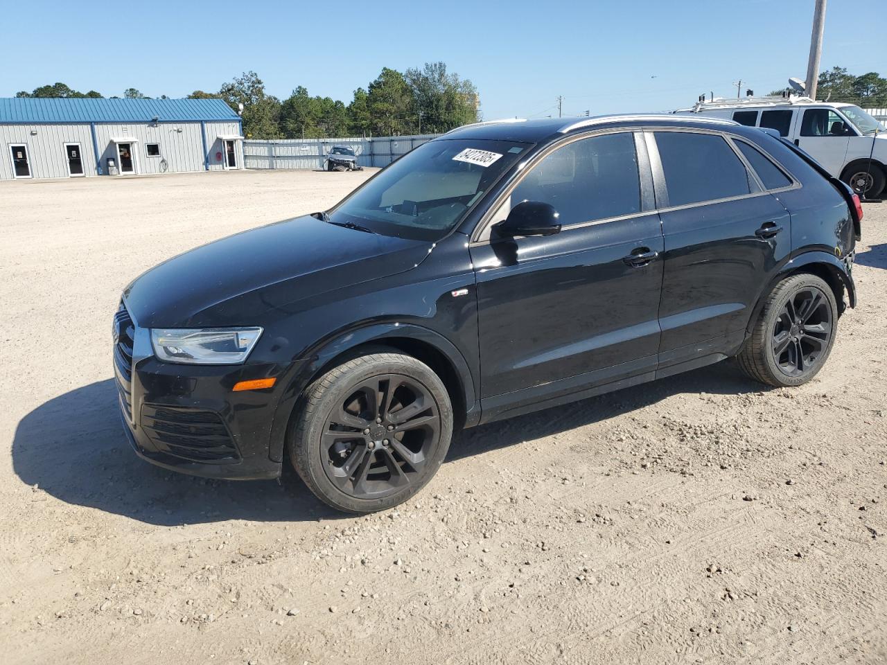 2018 Audi Q3 Premium, VIN WA1BCCFS5JR009035 — Rear end