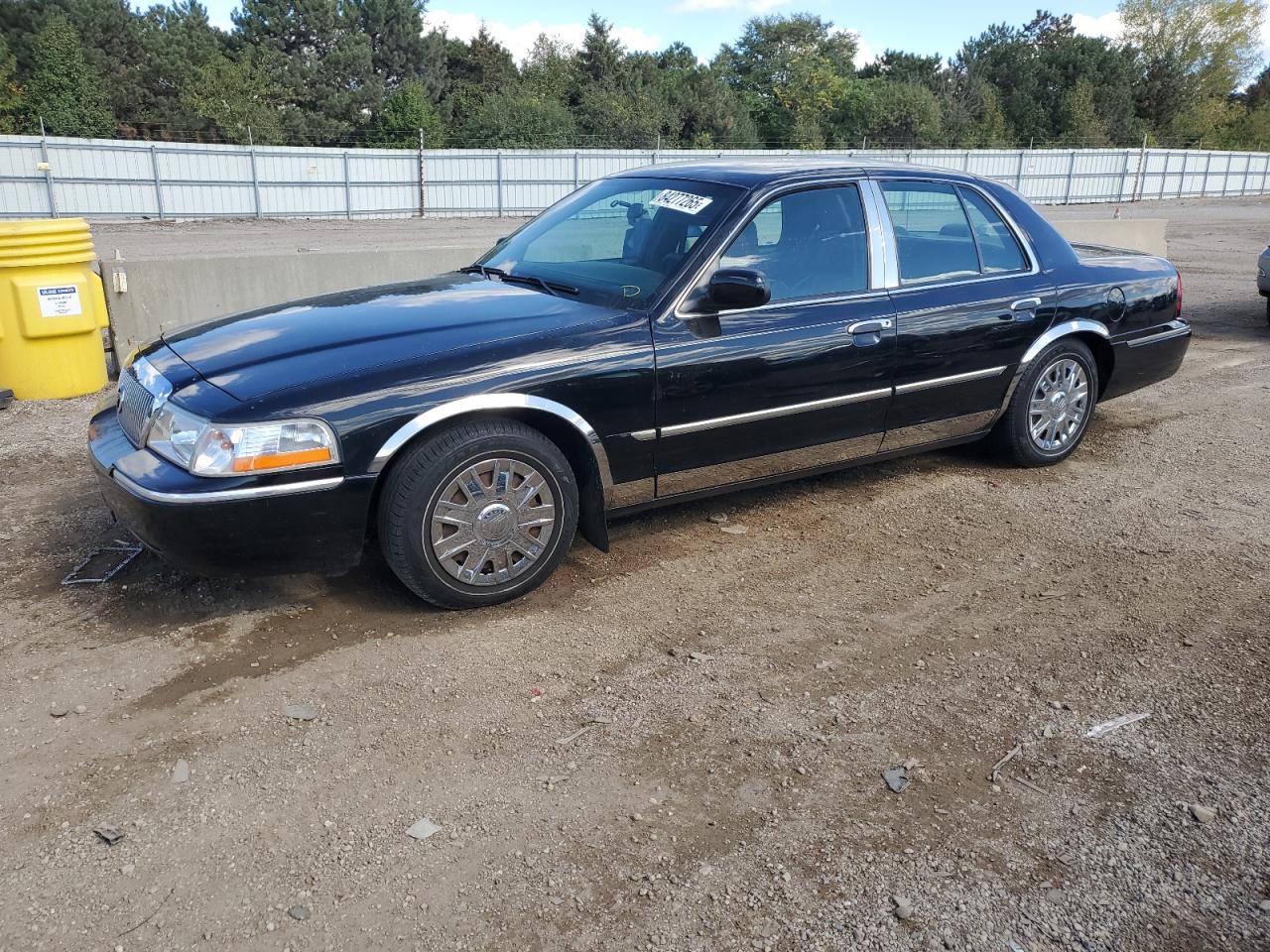 2005 Mercury Grand Marquis GS, VIN 2MEFM74W95X659594 — Undercarriage