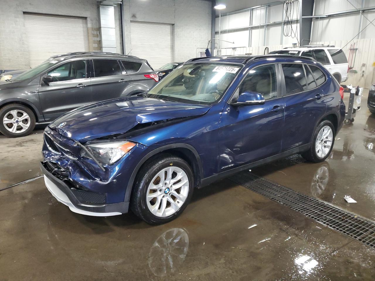 2015 BMW X1 xDrive28i, VIN WBAVL1C57FVY34012 — Front end