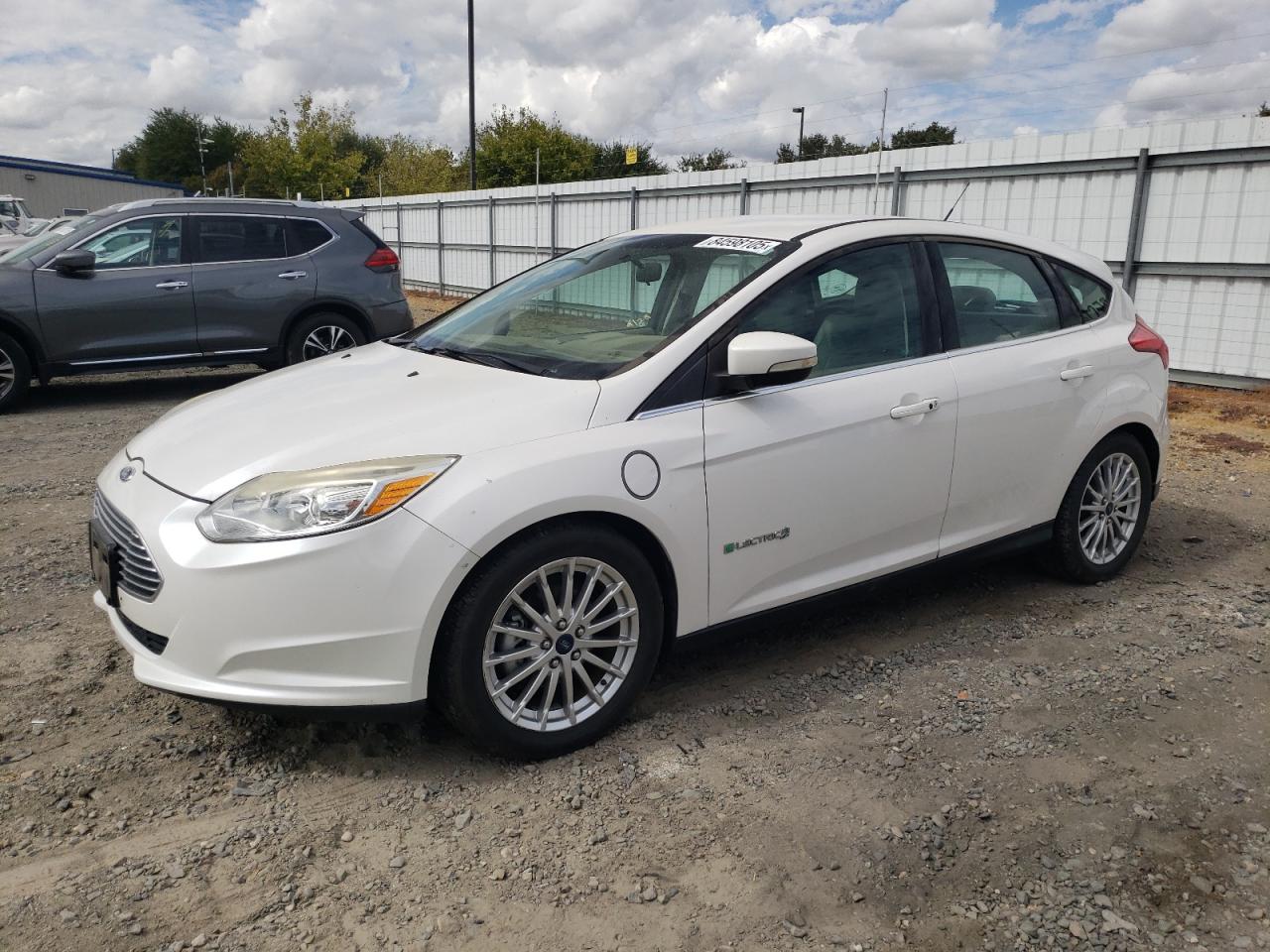 2015 Ford Focus Electric, VIN 1FADP3R46FL211303 — Normal wear
