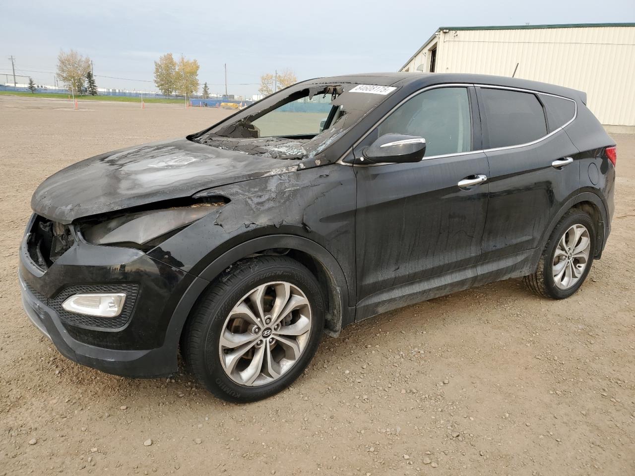 2013 Hyundai Santa Fe Sport, VIN 5XYZUDLA3DG116672 — Engine fire