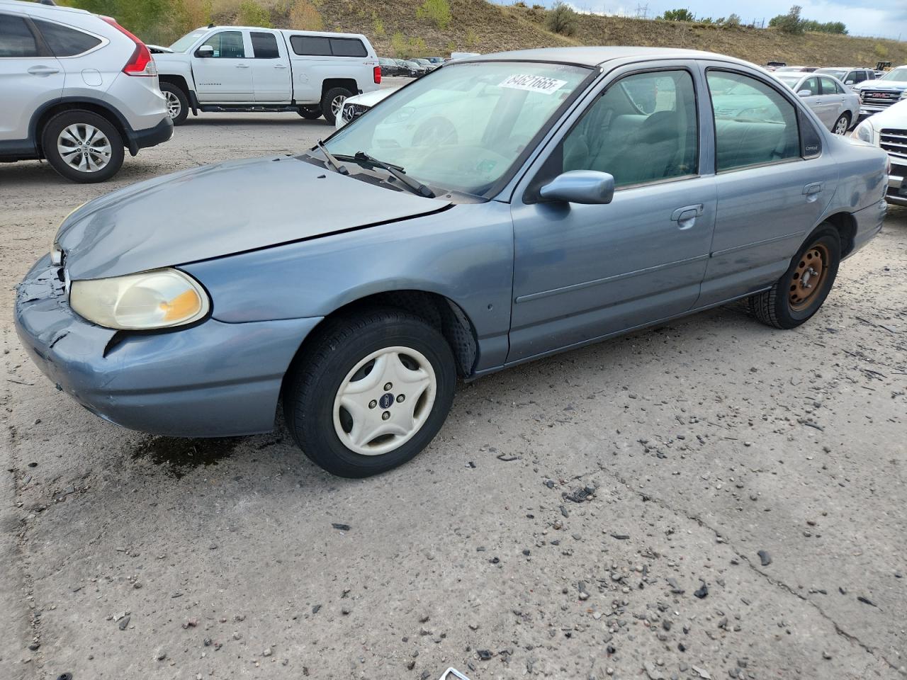 1999 Ford Contour LX, VIN 1FAFP6535XK235090 — Front end