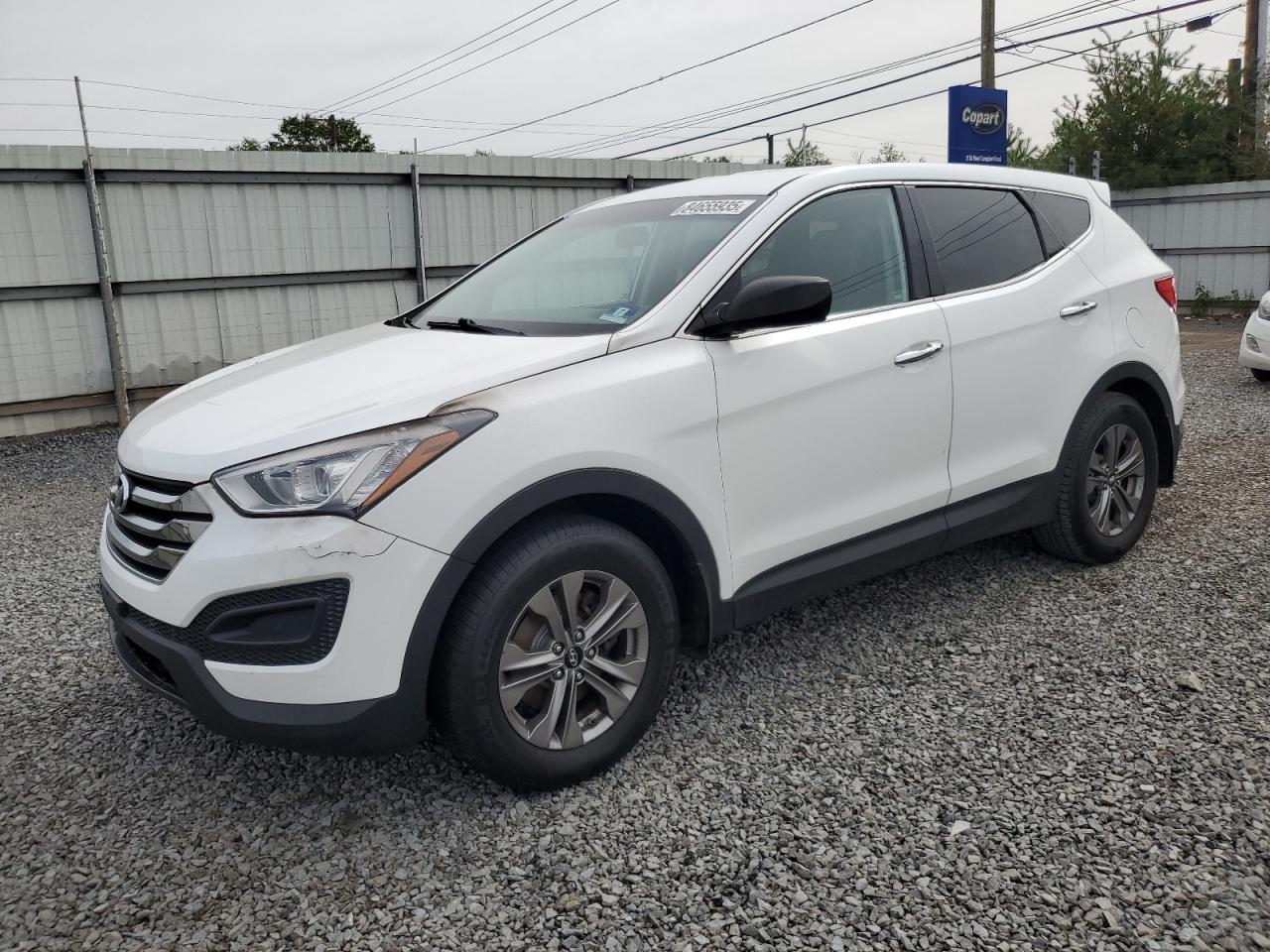 2015 Hyundai Santa Fe, VIN 5XYZTDLBXFG305057 — Engine fire
