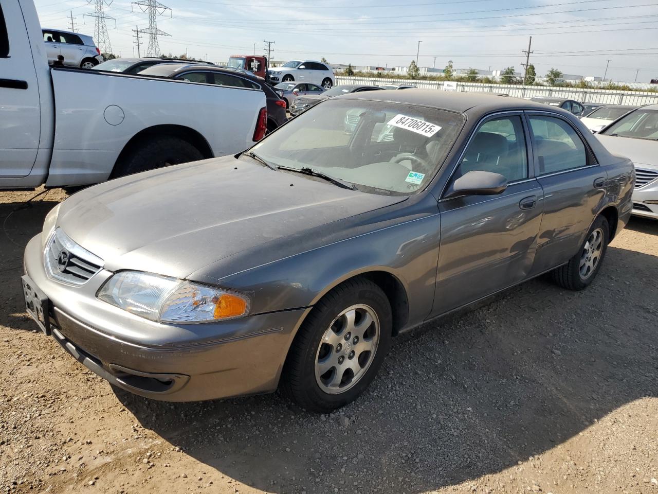 2001 Mazda 626 LX, VIN 1YVGF22C715200453 — Бок