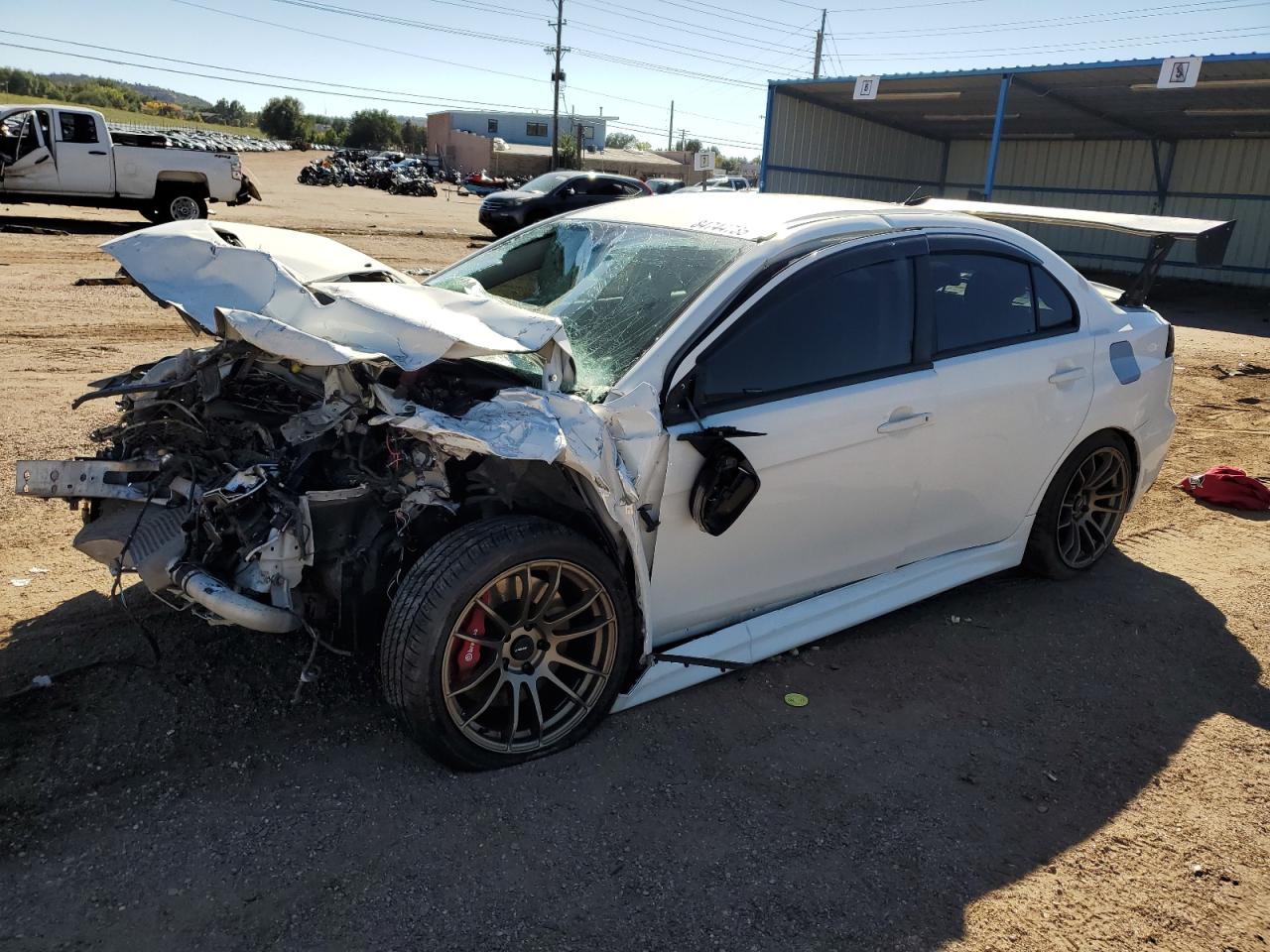 2015 Mitsubishi Lancer Evolution GSR, VIN JA32W8FV1FU020492 — Front end